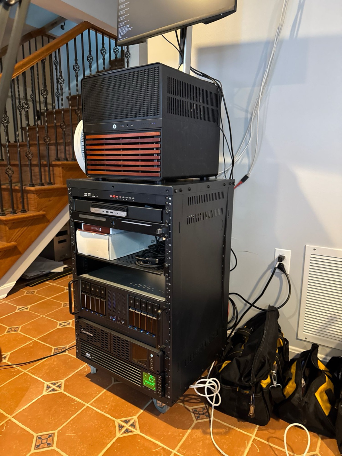 Mobile server rack with virtualization host, hot-swap storage, and UPS supporting lab compute